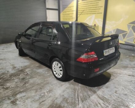 Чорний Міцубісі Lancer, об'ємом двигуна 1.6 л та пробігом 80 тис. км за 1919 $, фото 1 на Automoto.ua
