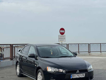 Черный Мицубиси Лансер, объемом двигателя 2 л и пробегом 104 тыс. км за 7600 $, фото 1 на Automoto.ua