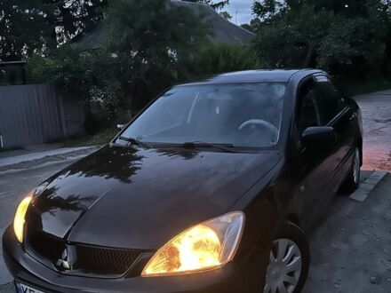 Міцубісі Lancer 2008 у Кам'янське (Дніпродзержинськ) на Automoto.ua Чорний Міцубісі Lancer, об'ємом двигуна 1.6 л та пробігом 250 тис. км за 3900 $, фото 1 на Automoto.ua