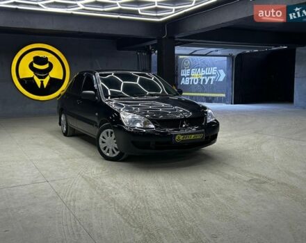 Черный Мицубиси Лансер, объемом двигателя 1.58 л и пробегом 286 тыс. км за 5900 $, фото 1 на Automoto.ua