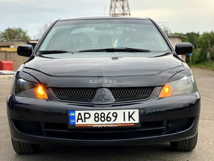 Чорний Міцубісі Lancer, об'ємом двигуна 1.6 л та пробігом 203 тис. км за 5500 $, фото 1 на Automoto.ua