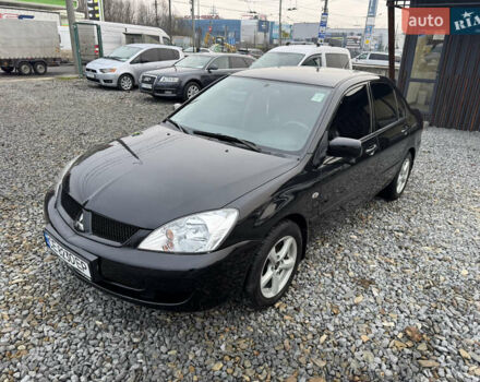 Черный Мицубиси Лансер, объемом двигателя 1.58 л и пробегом 202 тыс. км за 4100 $, фото 1 на Automoto.ua