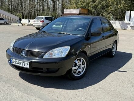 Міцубісі Lancer 2008 у Одесі на Automoto.ua Чорний Міцубісі Lancer, об'ємом двигуна 1.6 л та пробігом 217 тис. км за 4600 $, фото 1 на Automoto.ua