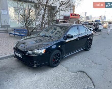 Чорний Міцубісі Lancer, об'ємом двигуна 2 л та пробігом 319 тис. км за 6800 $, фото 1 на Automoto.ua