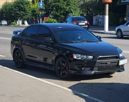 Чорний Міцубісі Lancer, об'ємом двигуна 2 л та пробігом 300 тис. км за 8300 $, фото 1 на Automoto.ua