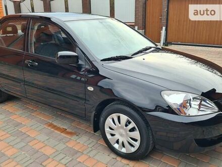 Міцубісі Lancer 2008 у Умани на Automoto.ua Чорний Міцубісі Lancer, об'ємом двигуна 1.6 л та пробігом 26 тис. км за 9000 $, фото 1 на Automoto.ua
