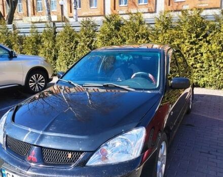 Чорний Міцубісі Lancer, об'ємом двигуна 1.58 л та пробігом 274 тис. км за 5000 $, фото 1 на Automoto.ua