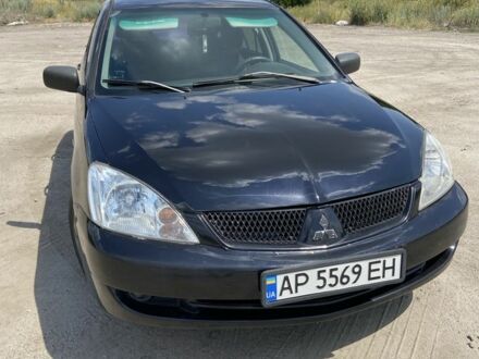 Мицубиси Лансер 2008 в Вольнянске на Automoto.ua Черный Мицубиси Лансер, объемом двигателя 1.6 л и пробегом 273 тыс. км за 4500 $, фото 1 на Automoto.ua