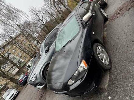 Черный Мицубиси Лансер, объемом двигателя 1.5 л и пробегом 126 тыс. км за 6499 $, фото 1 на Automoto.ua