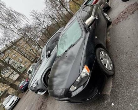 Черный Мицубиси Лансер, объемом двигателя 1.5 л и пробегом 126 тыс. км за 6499 $, фото 1 на Automoto.ua