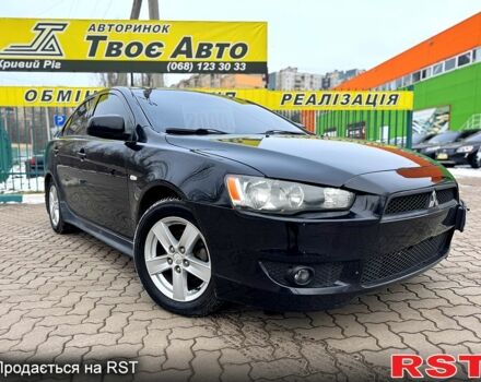 Черный Мицубиси Лансер, объемом двигателя 2 л и пробегом 20800 тыс. км за 6999 $, фото 1 на Automoto.ua