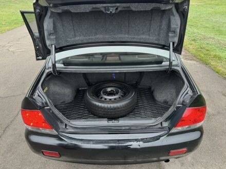 Чорний Міцубісі Lancer, об'ємом двигуна 1.6 л та пробігом 200 тис. км за 4400 $, фото 1 на Automoto.ua