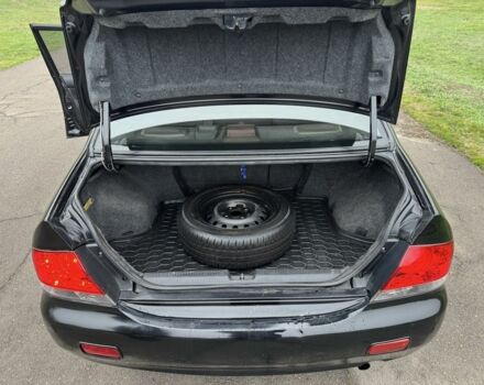 Чорний Міцубісі Lancer, об'ємом двигуна 1.6 л та пробігом 200 тис. км за 4400 $, фото 1 на Automoto.ua