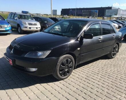Чорний Міцубісі Lancer, об'ємом двигуна 1.6 л та пробігом 356 тис. км за 4590 $, фото 1 на Automoto.ua