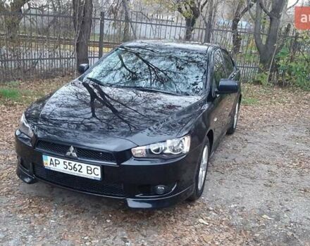 Черный Мицубиси Лансер, объемом двигателя 2 л и пробегом 63 тыс. км за 8000 $, фото 1 на Automoto.ua