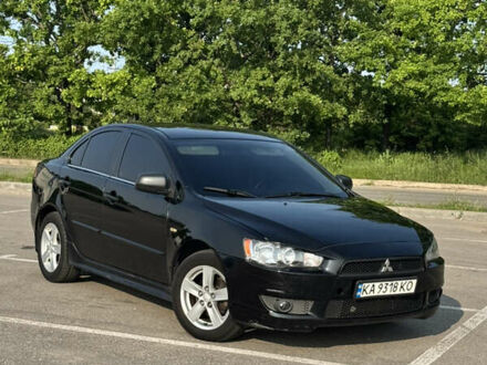 Чорний Міцубісі Lancer, об'ємом двигуна 2 л та пробігом 275 тис. км за 5500 $, фото 1 на Automoto.ua