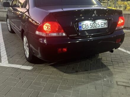 Черный Мицубиси Лансер, объемом двигателя 1.6 л и пробегом 168 тыс. км за 5662 $, фото 1 на Automoto.ua
