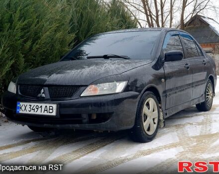 Чорний Міцубісі Lancer, об'ємом двигуна 1.6 л та пробігом 380 тис. км за 3999 $, фото 1 на Automoto.ua