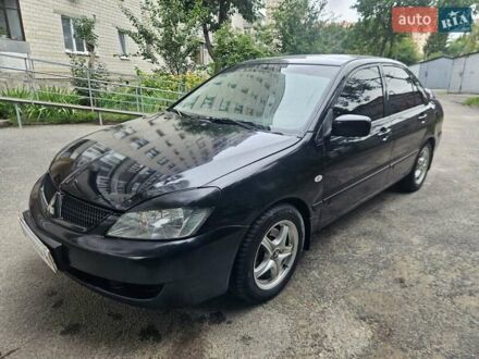 Міцубісі Lancer 2008 у Вінниці на Automoto.ua Чорний Міцубісі Lancer, об'ємом двигуна 1.6 л та пробігом 218 тис. км за 3500 $, фото 1 на Automoto.ua