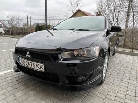 Чорний Міцубісі Lancer, об'ємом двигуна 2 л та пробігом 237 тис. км за 6800 $, фото 1 на Automoto.ua