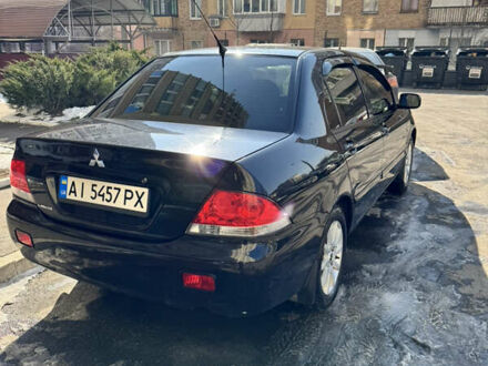 Міцубісі Lancer 2008 у Ирпене на Automoto.ua Чорний Міцубісі Lancer, об'ємом двигуна 1.58 л та пробігом 200 тис. км за 6000 $, фото 1 на Automoto.ua