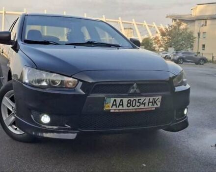 Чорний Міцубісі Lancer, об'ємом двигуна 2 л та пробігом 235 тис. км за 6500 $, фото 1 на Automoto.ua