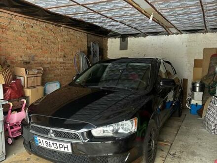 Черный Мицубиси Лансер, объемом двигателя 1.5 л и пробегом 137 тыс. км за 6500 $, фото 1 на Automoto.ua