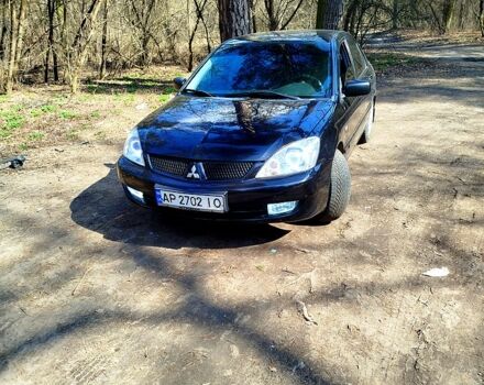 Черный Мицубиси Лансер, объемом двигателя 1.6 л и пробегом 0 тыс. км за 4500 $, фото 1 на Automoto.ua