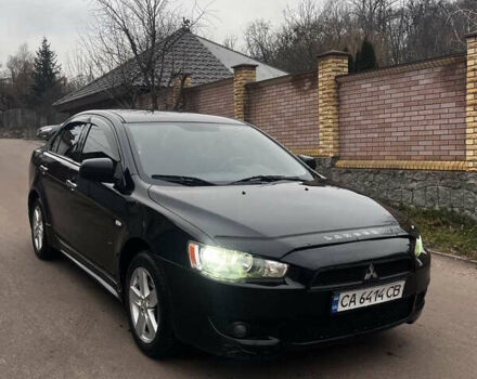 Чорний Міцубісі Lancer, об'ємом двигуна 2 л та пробігом 192 тис. км за 6300 $, фото 1 на Automoto.ua