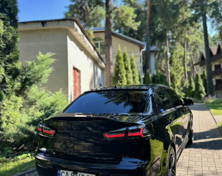 Чорний Міцубісі Lancer, об'ємом двигуна 2 л та пробігом 206 тис. км за 8000 $, фото 1 на Automoto.ua