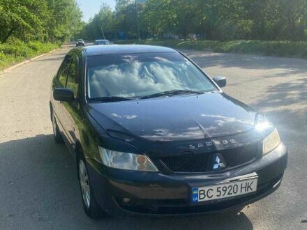 Чорний Міцубісі Lancer, об'ємом двигуна 1.6 л та пробігом 388 тис. км за 4600 $, фото 1 на Automoto.ua