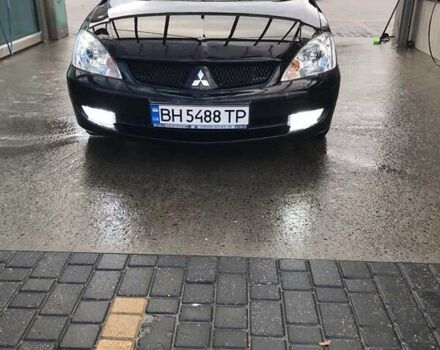 Черный Мицубиси Лансер, объемом двигателя 1.6 л и пробегом 124 тыс. км за 6500 $, фото 1 на Automoto.ua