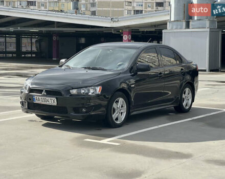Чорний Міцубісі Lancer, об'ємом двигуна 2 л та пробігом 219 тис. км за 6500 $, фото 1 на Automoto.ua