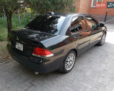Чорний Міцубісі Lancer, об'ємом двигуна 1.6 л та пробігом 445 тис. км за 2999 $, фото 1 на Automoto.ua