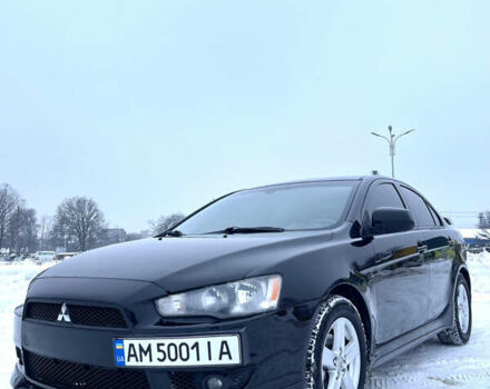 Черный Мицубиси Лансер, объемом двигателя 2 л и пробегом 303 тыс. км за 6300 $, фото 1 на Automoto.ua