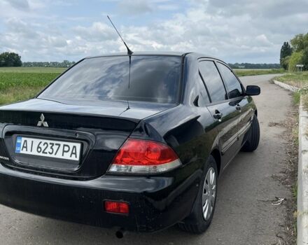 Чорний Міцубісі Lancer, об'ємом двигуна 1.6 л та пробігом 3 тис. км за 5900 $, фото 1 на Automoto.ua