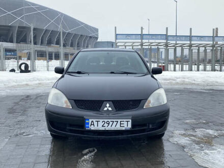 Черный Мицубиси Лансер, объемом двигателя 1.6 л и пробегом 223 тыс. км за 3700 $, фото 1 на Automoto.ua