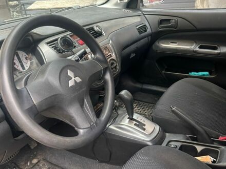 Чорний Міцубісі Lancer, об'ємом двигуна 1.6 л та пробігом 227 тис. км за 3800 $, фото 1 на Automoto.ua