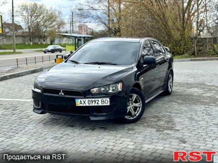 Чорний Міцубісі Lancer, об'ємом двигуна 1.5 л та пробігом 210 тис. км за 5999 $, фото 1 на Automoto.ua
