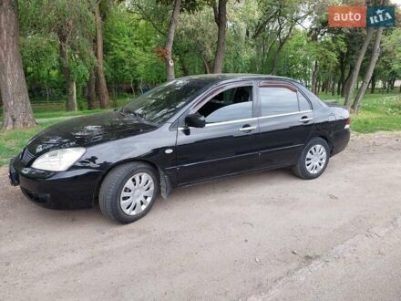 Мицубиси Лансер 2008 в Днепре (Днепропетровске) на Automoto.ua Черный Мицубиси Лансер, объемом двигателя 1.6 л и пробегом 215 тыс. км за 4900 $, фото 1 на Automoto.ua
