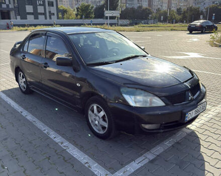 Чорний Міцубісі Lancer, об'ємом двигуна 1.58 л та пробігом 364 тис. км за 3000 $, фото 1 на Automoto.ua