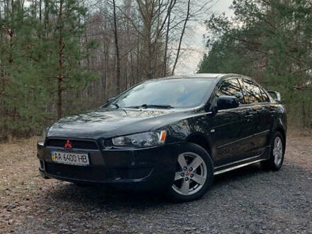 Черный Мицубиси Лансер, объемом двигателя 1.5 л и пробегом 295 тыс. км за 5650 $, фото 1 на Automoto.ua