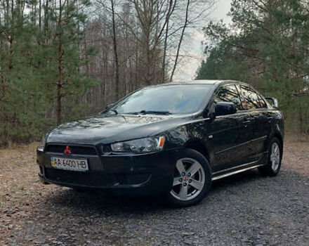 Черный Мицубиси Лансер, объемом двигателя 1.5 л и пробегом 295 тыс. км за 5650 $, фото 1 на Automoto.ua