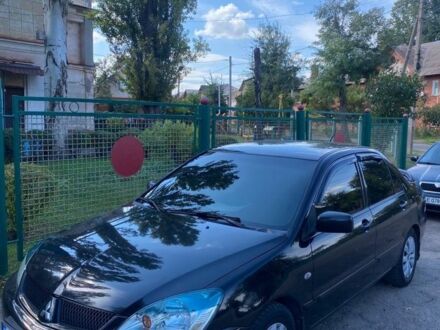 Мицубиси Лансер 2008 в Кривом Роге на Automoto.ua Черный Мицубиси Лансер, объемом двигателя 1.6 л и пробегом 230 тыс. км за 4380 $, фото 1 на Automoto.ua