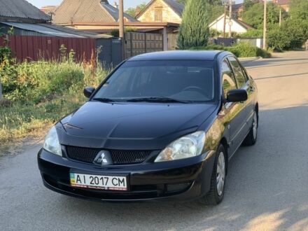 Чорний Міцубісі Lancer, об'ємом двигуна 1.6 л та пробігом 220 тис. км за 3850 $, фото 1 на Automoto.ua