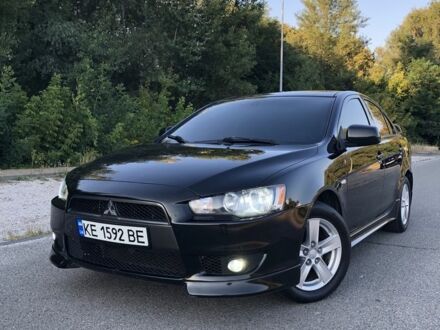 Чорний Міцубісі Lancer, об'ємом двигуна 2 л та пробігом 240 тис. км за 6204 $, фото 1 на Automoto.ua