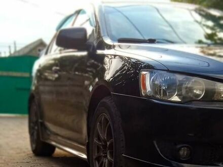 Чорний Міцубісі Lancer, об'ємом двигуна 2 л та пробігом 213 тис. км за 6200 $, фото 1 на Automoto.ua