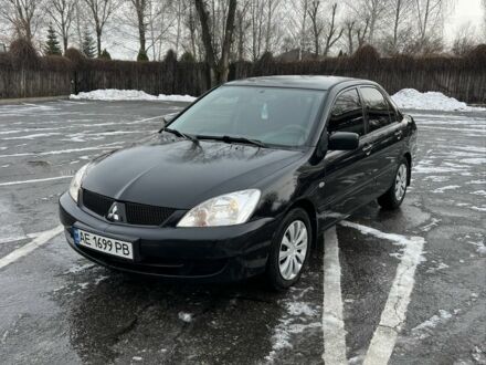 Чорний Міцубісі Lancer, об'ємом двигуна 1.6 л та пробігом 219 тис. км за 4300 $, фото 1 на Automoto.ua