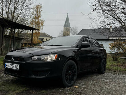 Черный Мицубиси Лансер, объемом двигателя 1.5 л и пробегом 278 тыс. км за 4200 $, фото 1 на Automoto.ua