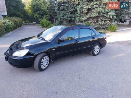 Мицубиси Лансер 2008 в Днепре (Днепропетровске) на Automoto.ua Черный Мицубиси Лансер, объемом двигателя 1.6 л и пробегом 216 тыс. км за 4500 $, фото 1 на Automoto.ua